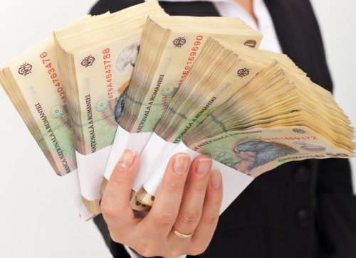 Femeie de afaceri cu bani