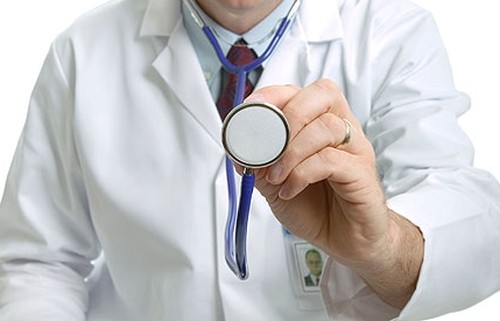 Doctor holding out his stethoscope