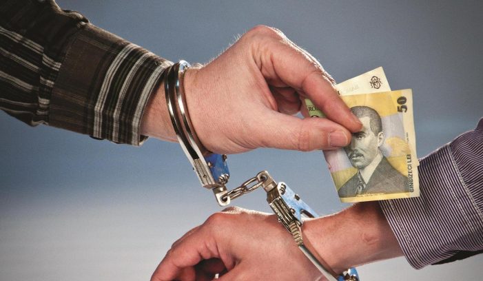 Polițist din Negrești-Oaș, reținut pentru luare de mită în urma unui flagrant
