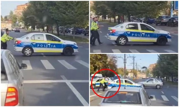 Poliţişti, filmaţi în timp ce împing o autospecială în mijlocul străzii